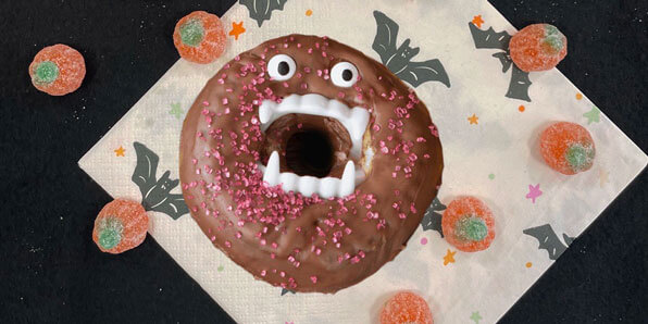 donut with teeth and eyes