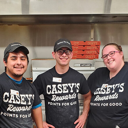 Casey's team members in a kitchen